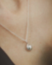 Load and play video in Gallery viewer, THE DOT NECKLACE - ORGANIC SILVER PEBBLE NECKLACE