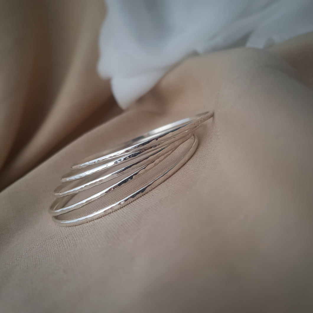 RECYCLED SILVER SKINNY STACKING BANGLES