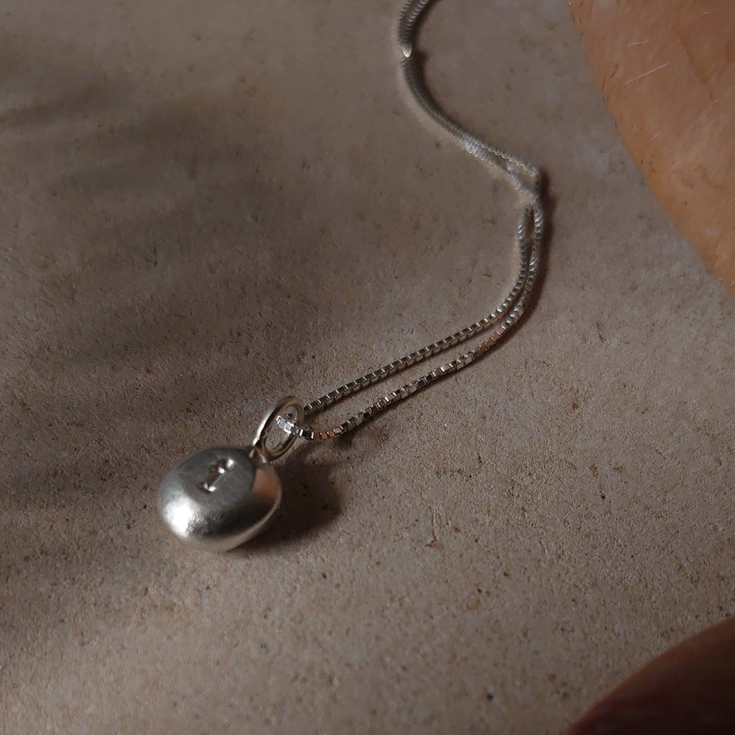 ORGANIC RECYCLED SILVER PEBBLE INITIAL NECKLACE