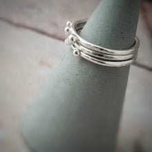 Load image into Gallery viewer, THREE SILVER STACKING DOT RINGS
