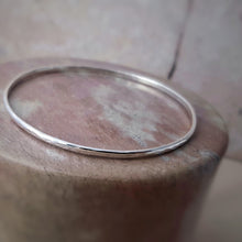 Load image into Gallery viewer, SET OF 2 RECYCLED SILVER SKINNY STACKING BANGLES
